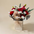 Simply Red artificial bouquet with crimson, blush and white blooms in its included presentation box and wrapping