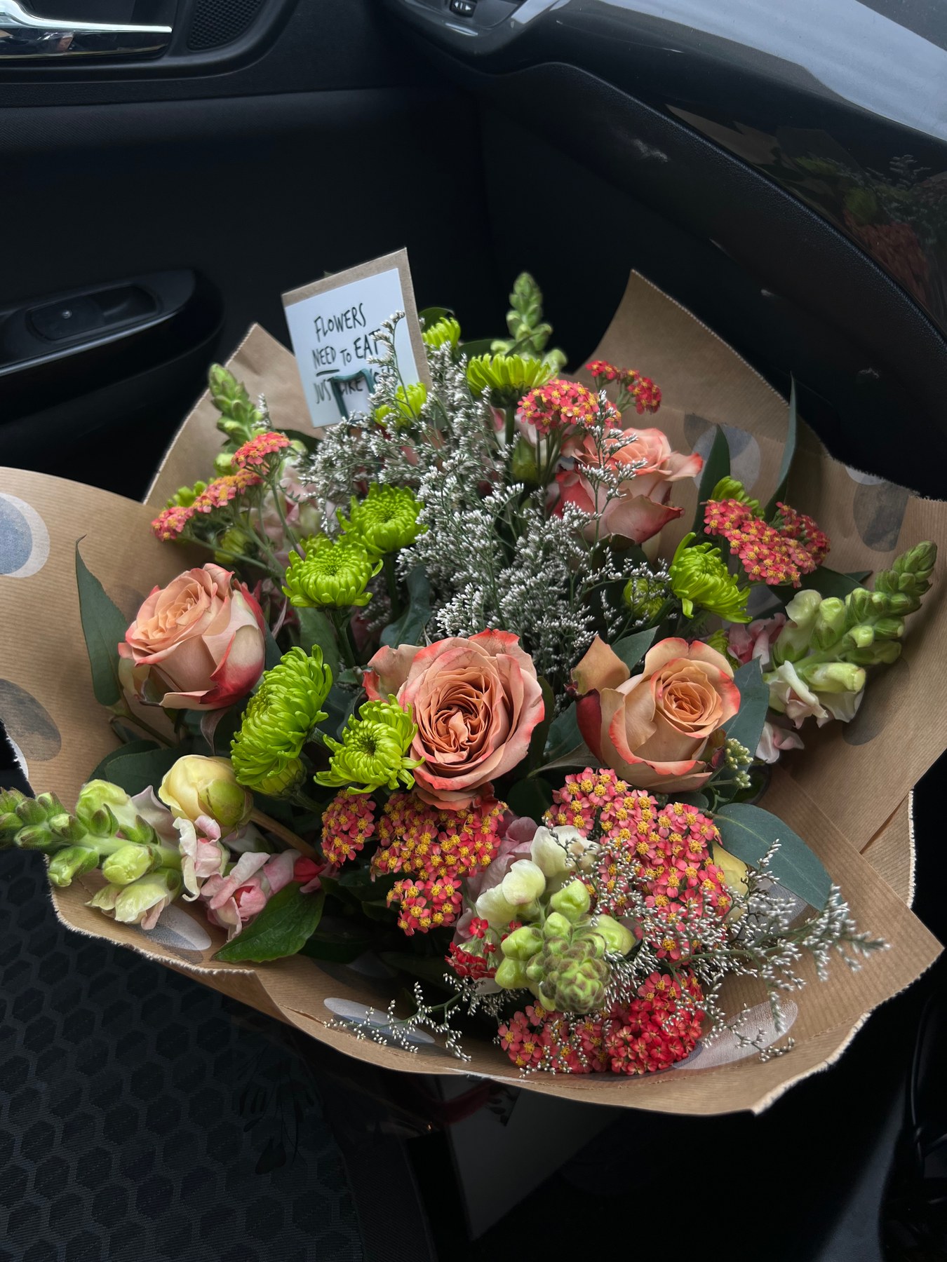 Seasonal subscription bouquet with peach roses and green chrysanthemums